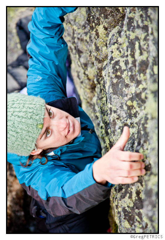Ashley takes on an alpine bouldering problem